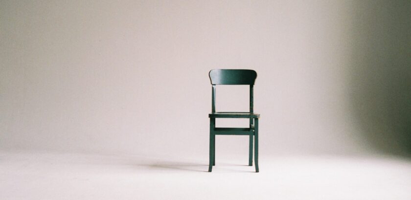 minimalist chair in room alone